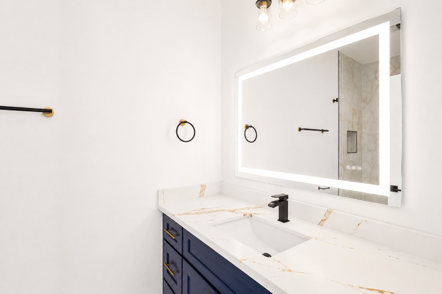 4606 Mallow Street, Unit A Houston, TX 77051 - Photo 11 of 21 a bathroom with a sink vanity and a mirror