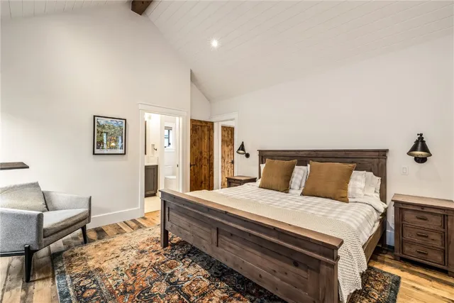 a bedroom with a bed and furniture