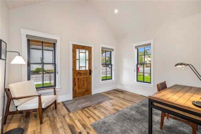 a workspace with furniture and window