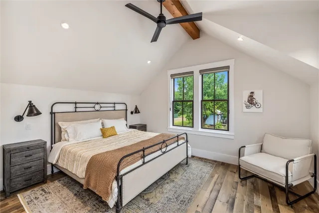 a bed room with a bed and a couch