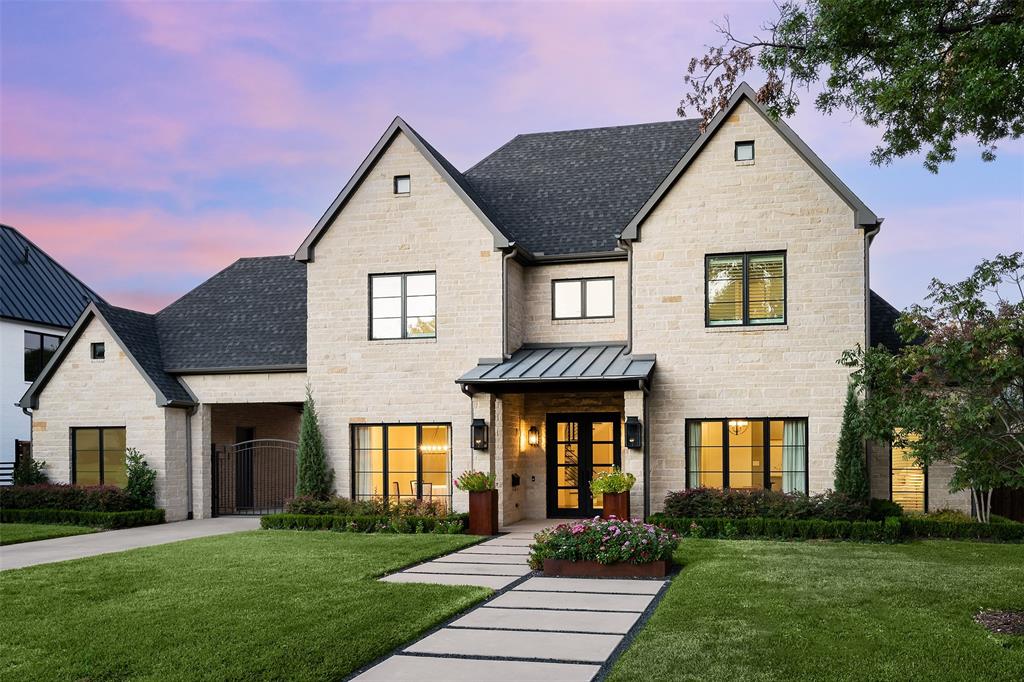 11050 Lawnhaven Road Dallas, TX 75230 - Photo 1 of 1 a front view of a house with a yard and porch