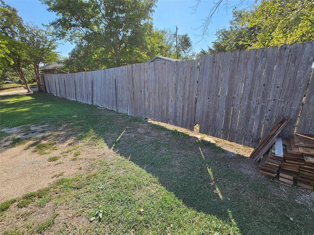 Tbd Tbd Mckinney Street Princeton, TX 75407 - Photo 2 of 7 a view of a backyard with wooden fence