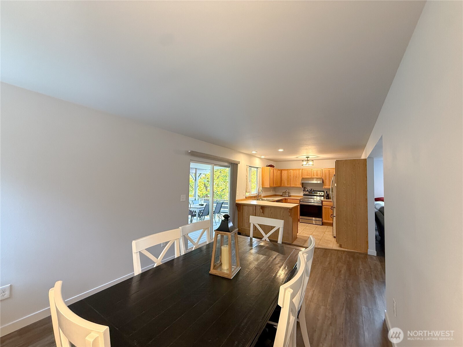 40 Trail Ridge Drive Omak, WA 98841 - Photo 12 of 36 a view of a dining room with furniture window and wooden floor