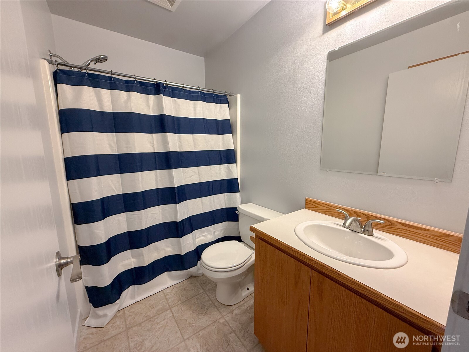 40 Trail Ridge Drive Omak, WA 98841 - Photo 21 of 36 a bathroom with a sink toilet and shower