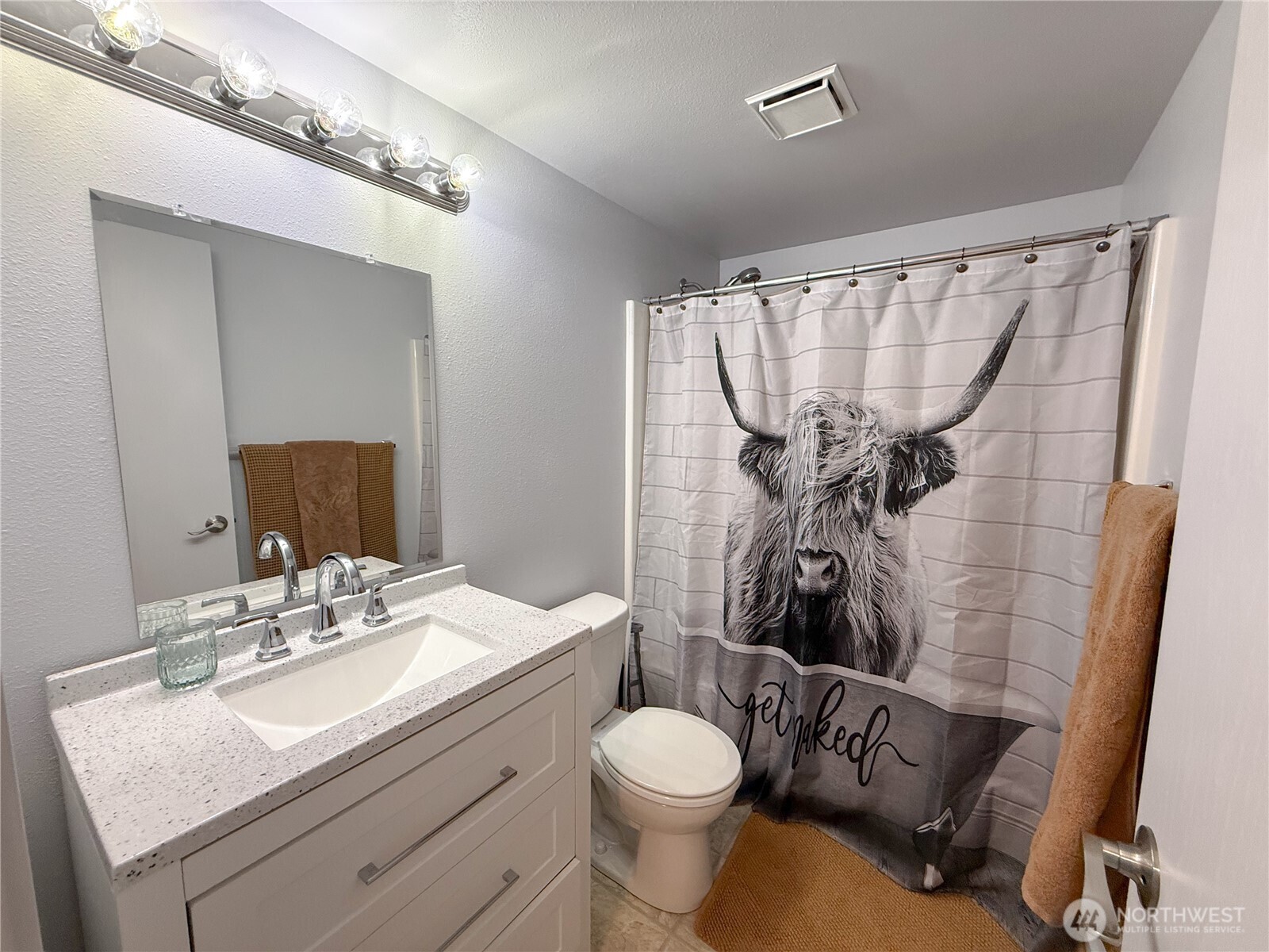 40 Trail Ridge Drive Omak, WA 98841 - Photo 27 of 36 a bathroom with a sink toilet and shower
