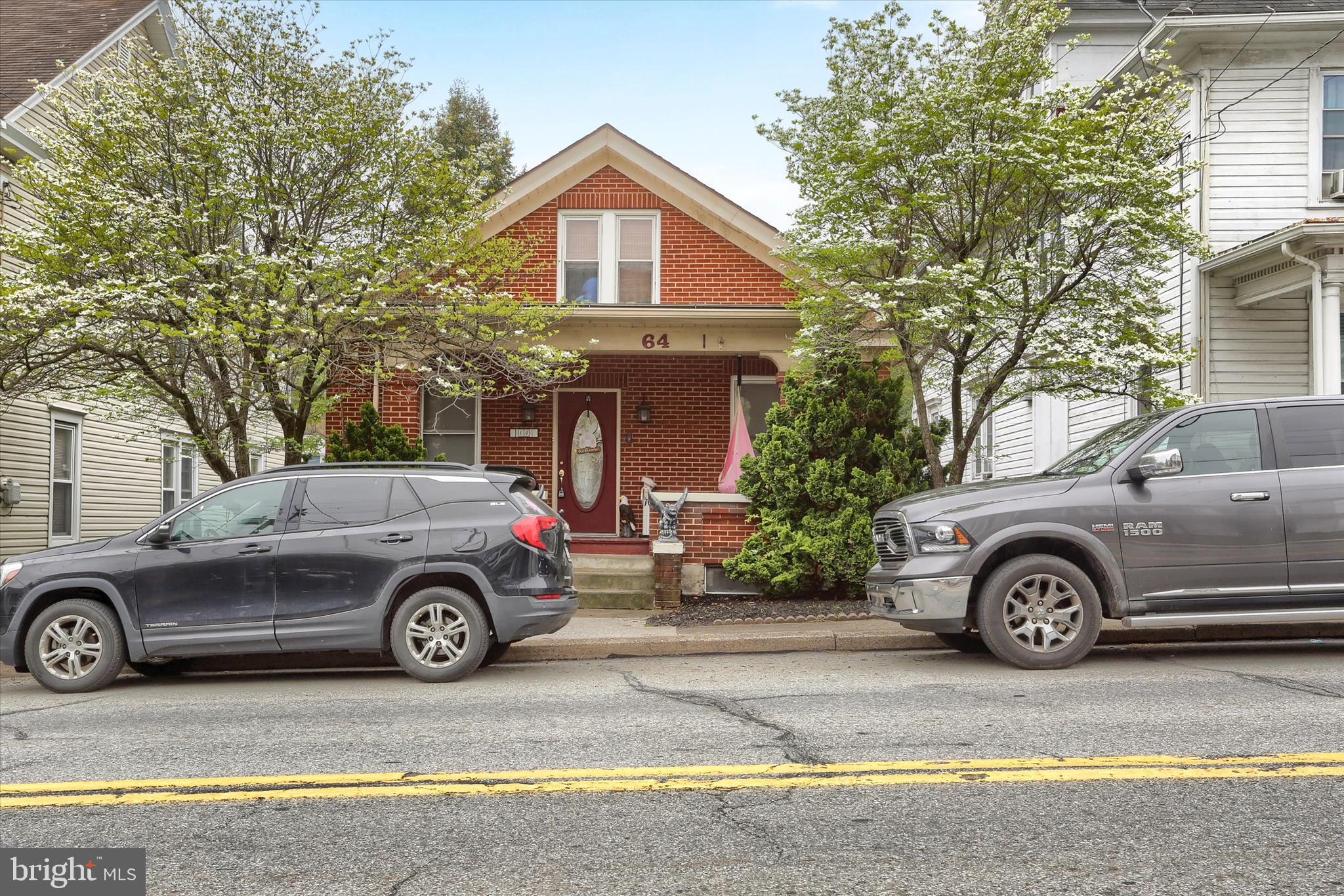64 East Main Street Elizabethville, PA 17023 - Photo 1 of 29 a front view of a house with parking space