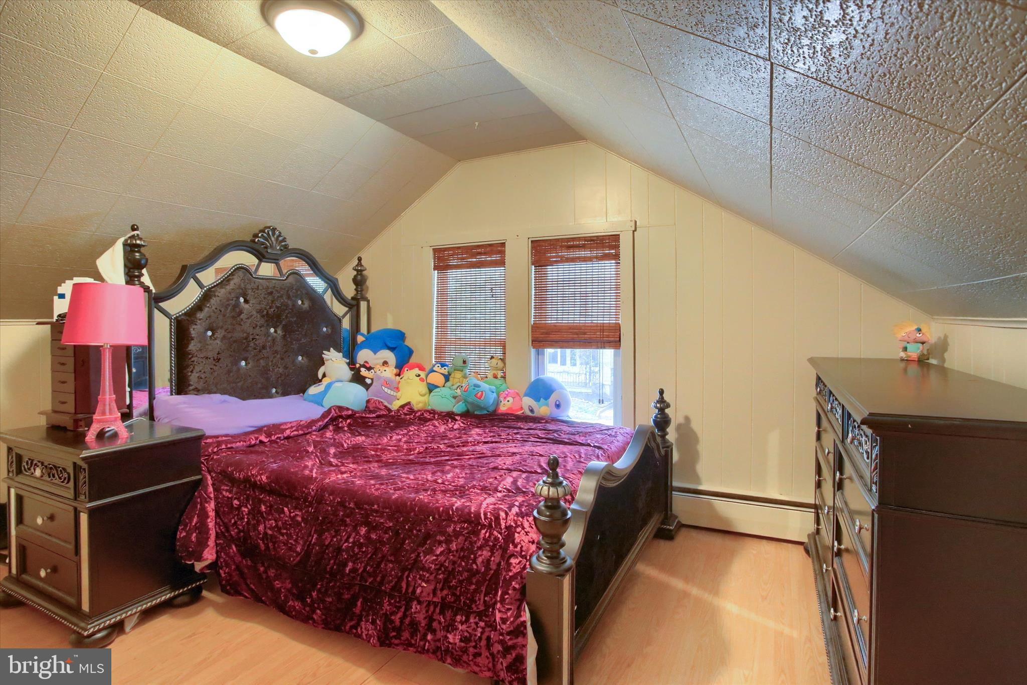 64 East Main Street Elizabethville, PA 17023 - Photo 14 of 29 a bedroom with a bed and a dresser