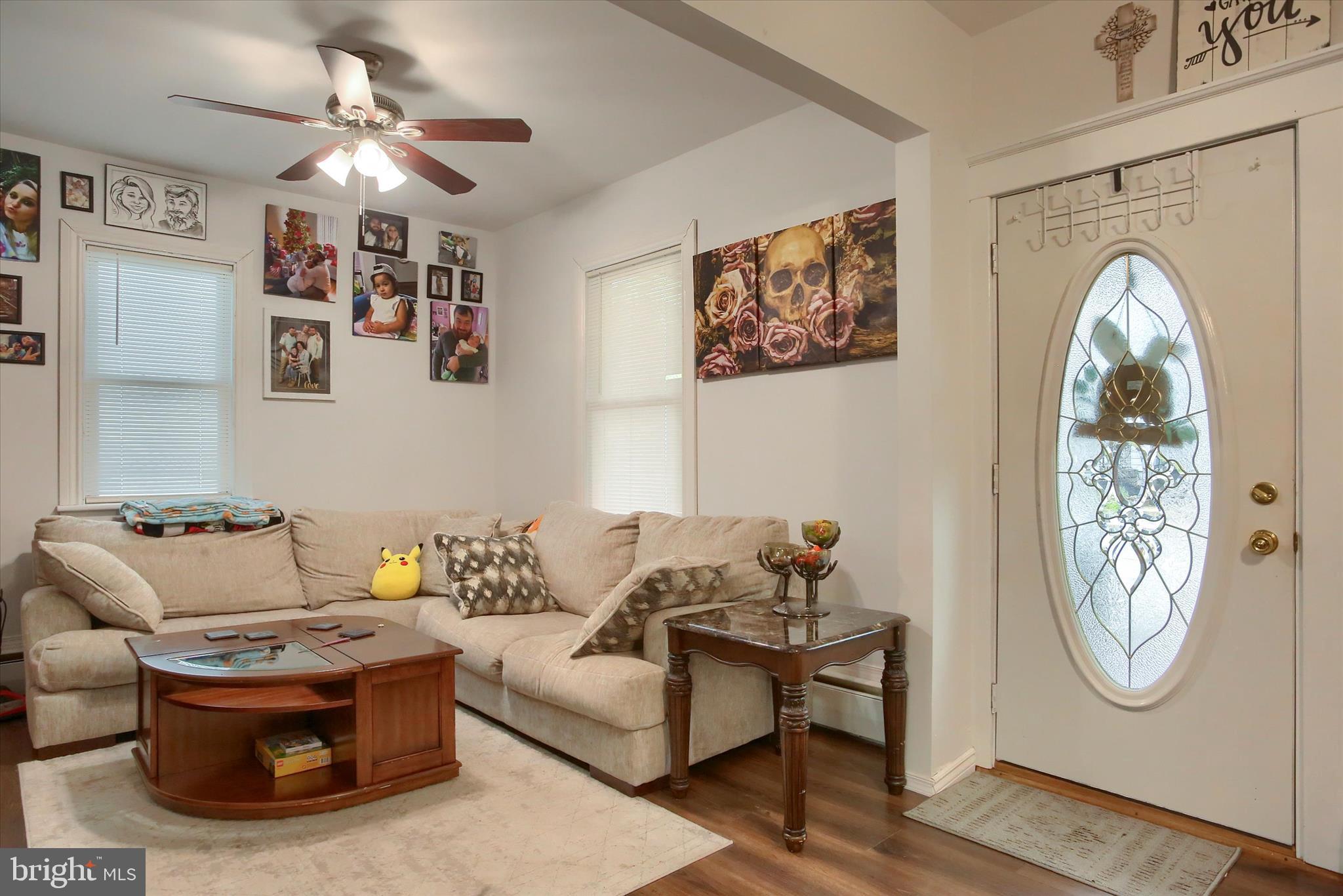 64 East Main Street Elizabethville, PA 17023 - Photo 4 of 29 a living room with furniture and a window
