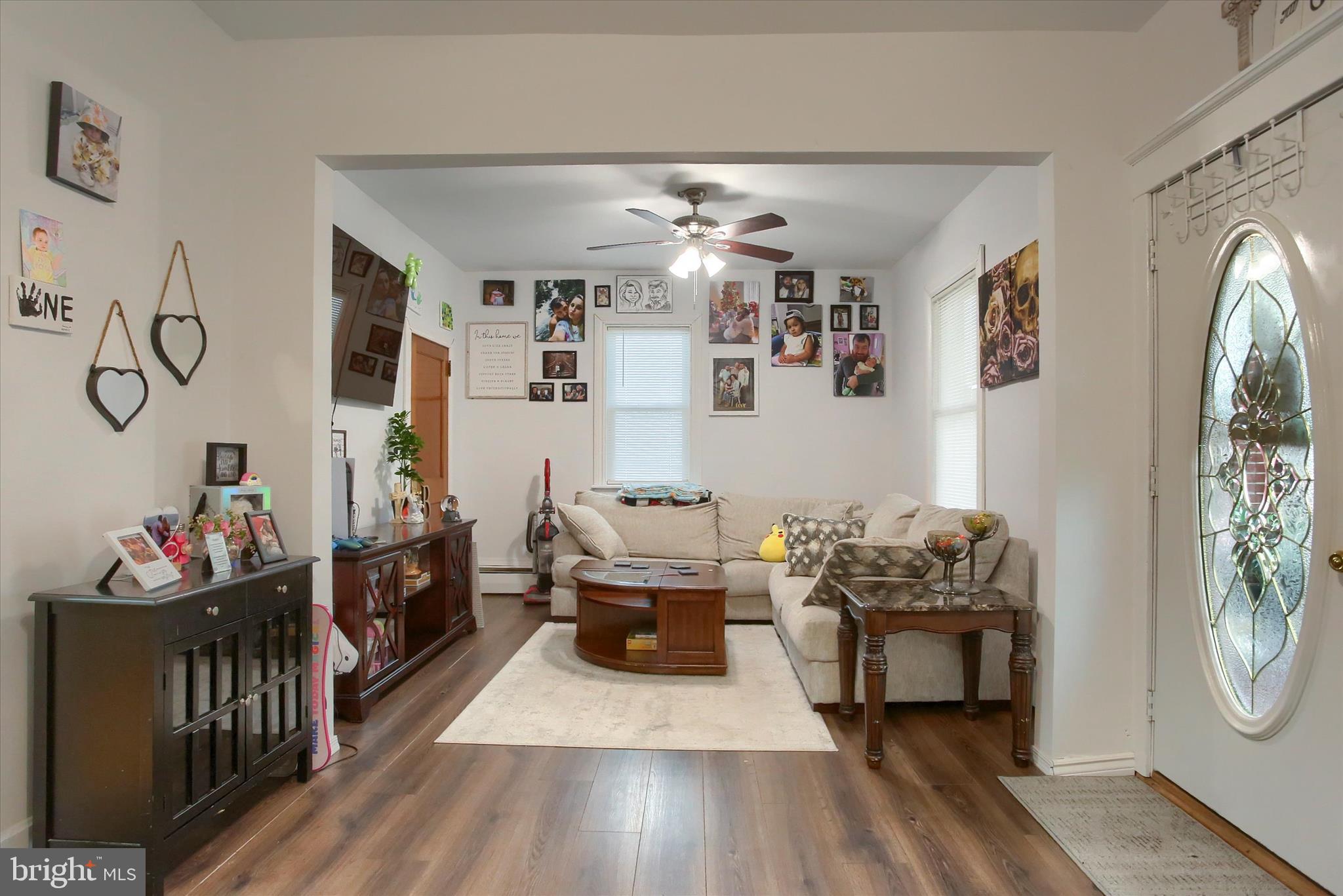 64 East Main Street Elizabethville, PA 17023 - Photo 5 of 29 a living room with furniture and a flat screen tv