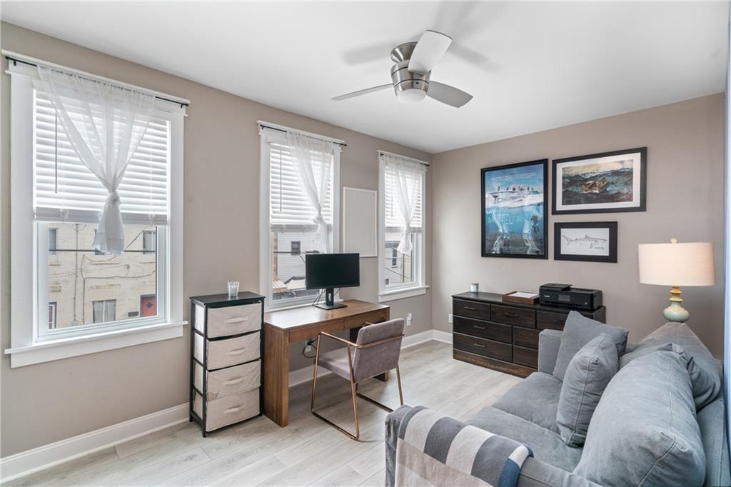 5208 Keystone Street Pittsburgh, PA 15201 - Photo 11 of 23 a view of a livingroom with workspace and a window