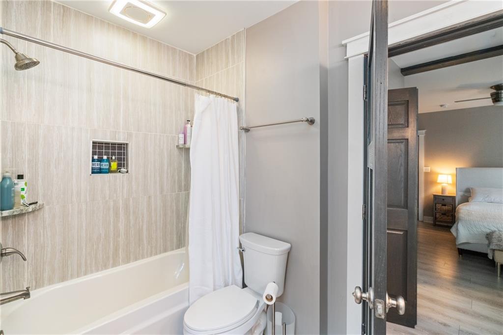 5208 Keystone Street Pittsburgh, PA 15201 - Photo 16 of 23 a bathroom with a toilet a sink and shower