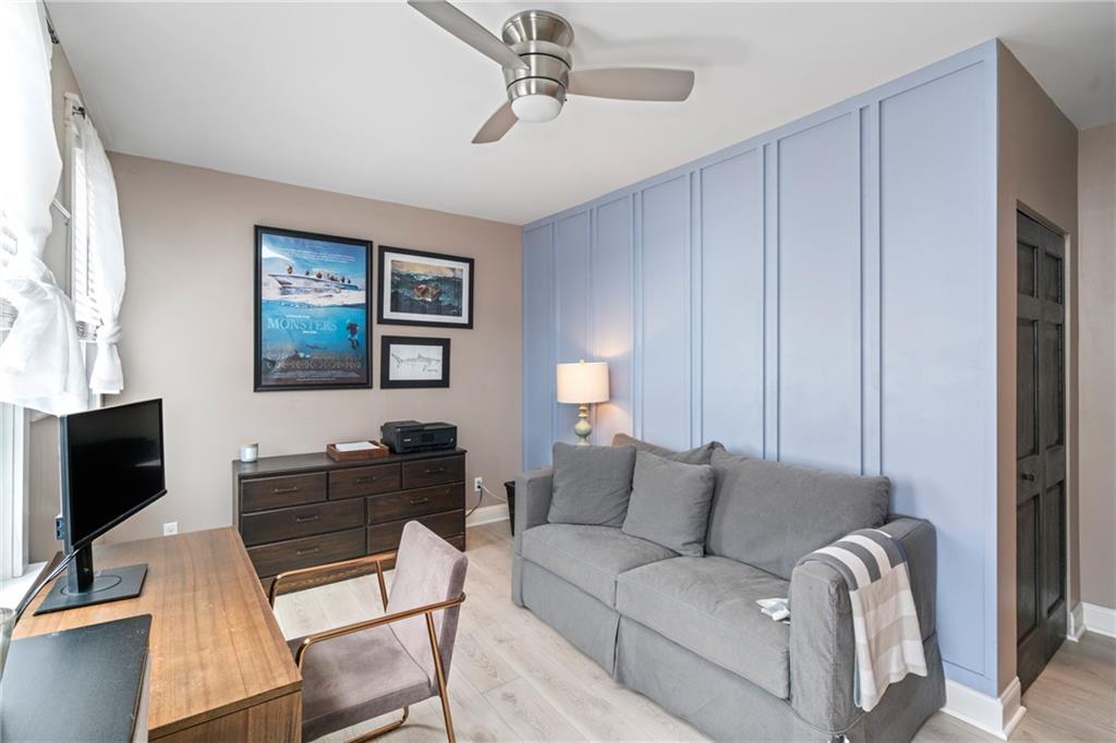 5208 Keystone Street Pittsburgh, PA 15201 - Photo 17 of 23 a living room with furniture and a flat screen tv