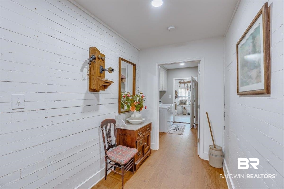 14160 Moffett Road Wilmer, AL 36587 - Photo 29 of 75 Corridor with light wood-style floors