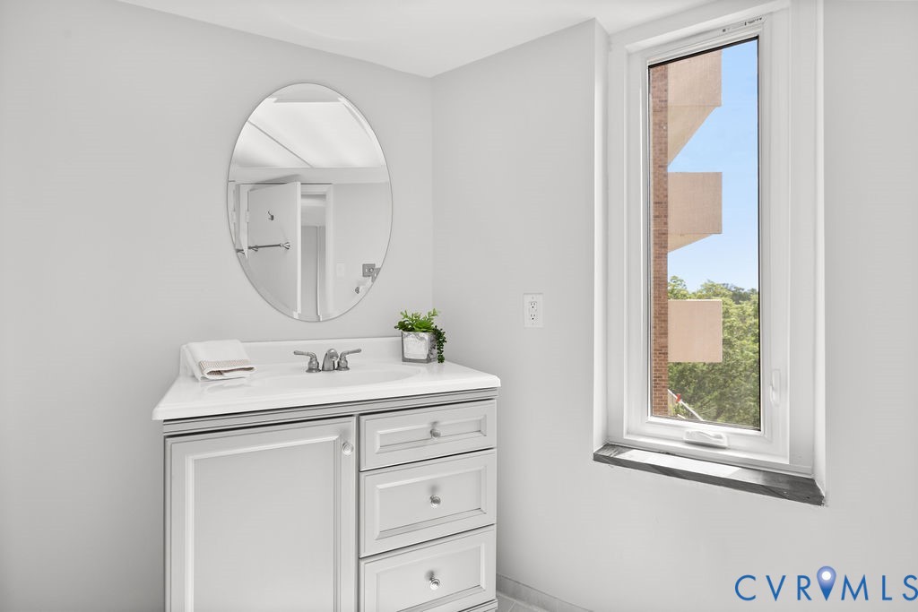 2956 Hathaway Road, Unit U704 Richmond, VA 23225 - Photo 29 of 42 Bathroom featuring a single vanity with a white co