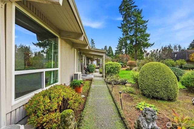 a view of a backyard with garden