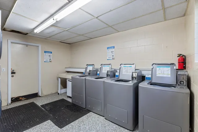 a view of livingroom with washer and dryer