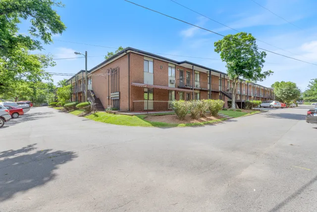 a view of a house with a big yard