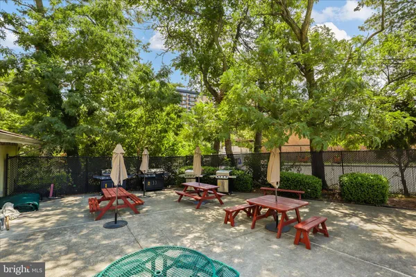 a view of an outdoor space and tennis court