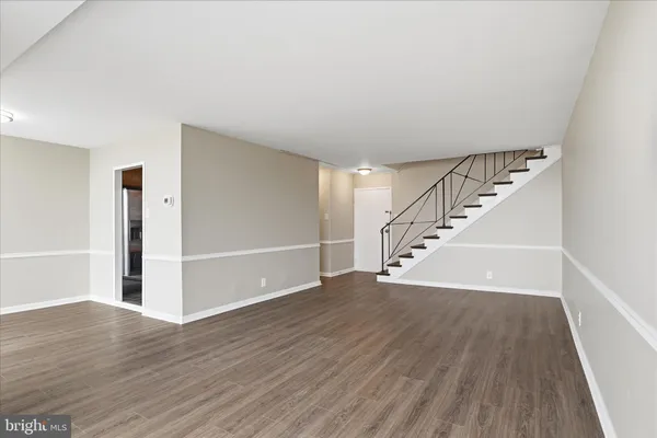 a view of entryway with wooden floor