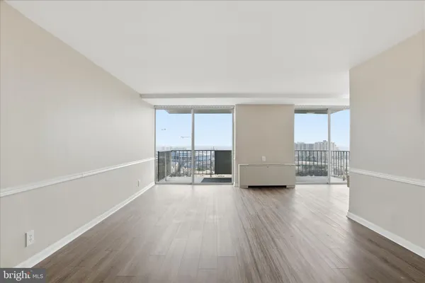 a view of a livingroom with wooden floor