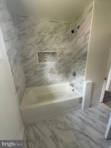 a bathroom with a bathtub