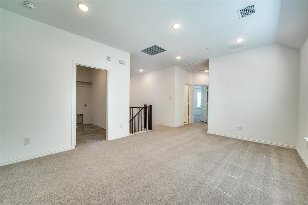 7336 Panicum Drive Frisco, TX 75033 - Photo 18 of 25 an empty room with a projector and a projector room