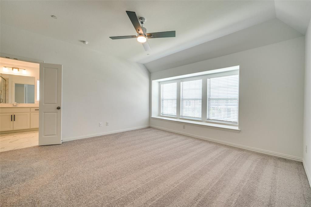 7336 Panicum Drive Frisco, TX 75033 - Photo 21 of 25 a view of an empty room with a window