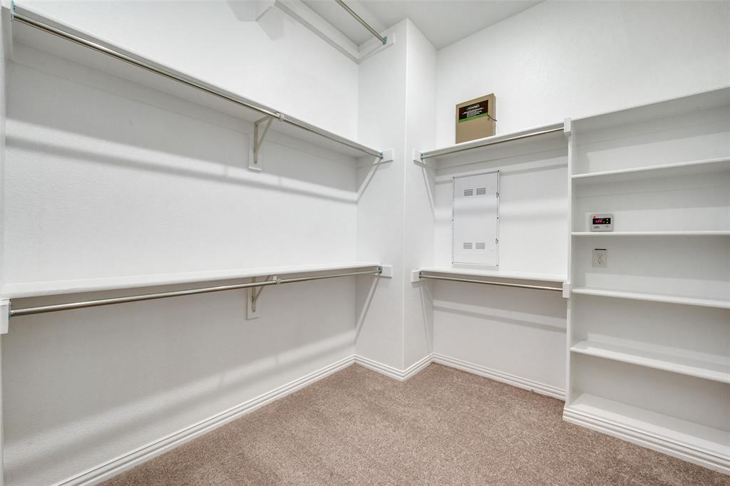 7336 Panicum Drive Frisco, TX 75033 - Photo 22 of 25 a view of an empty walk in closet