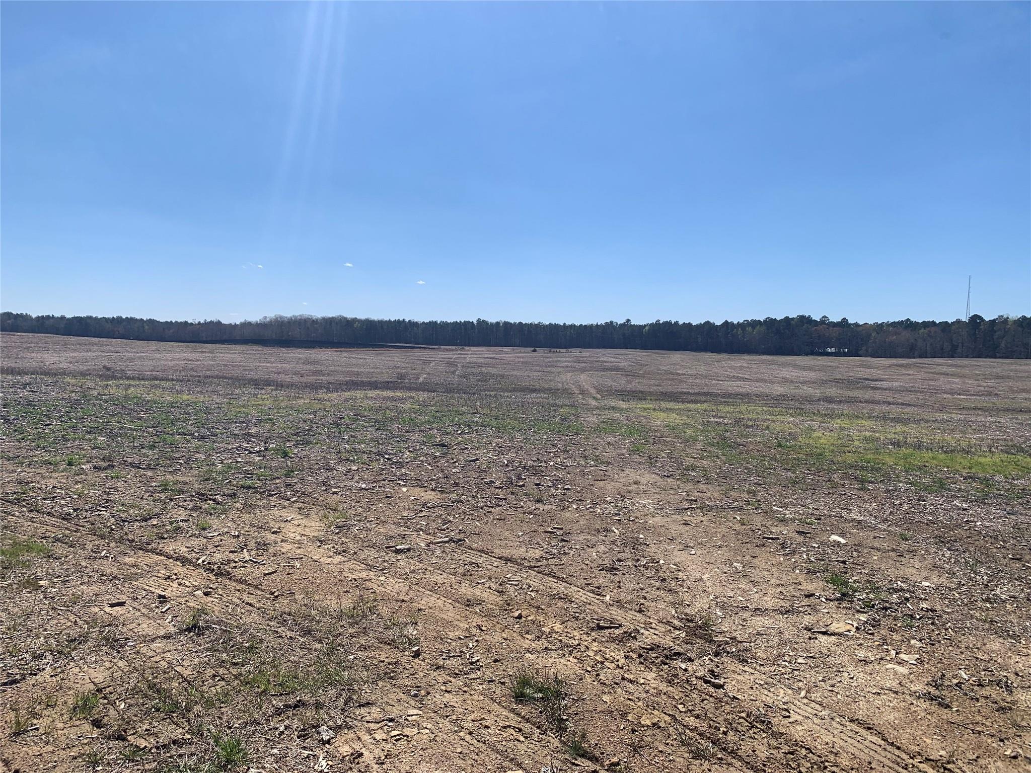 0 Doster Road Monroe, NC 28112 - Photo 2 of 4 a view of an ocean beach and mountain