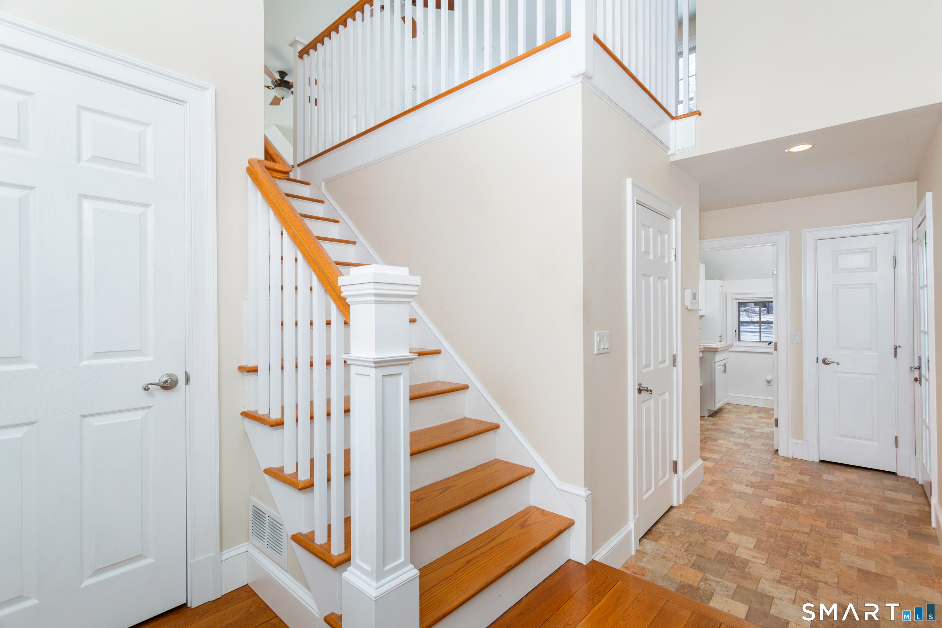 51 Wilson Road Easton, CT 06612 - Photo 13 of 41 a view of a hallway with staircase