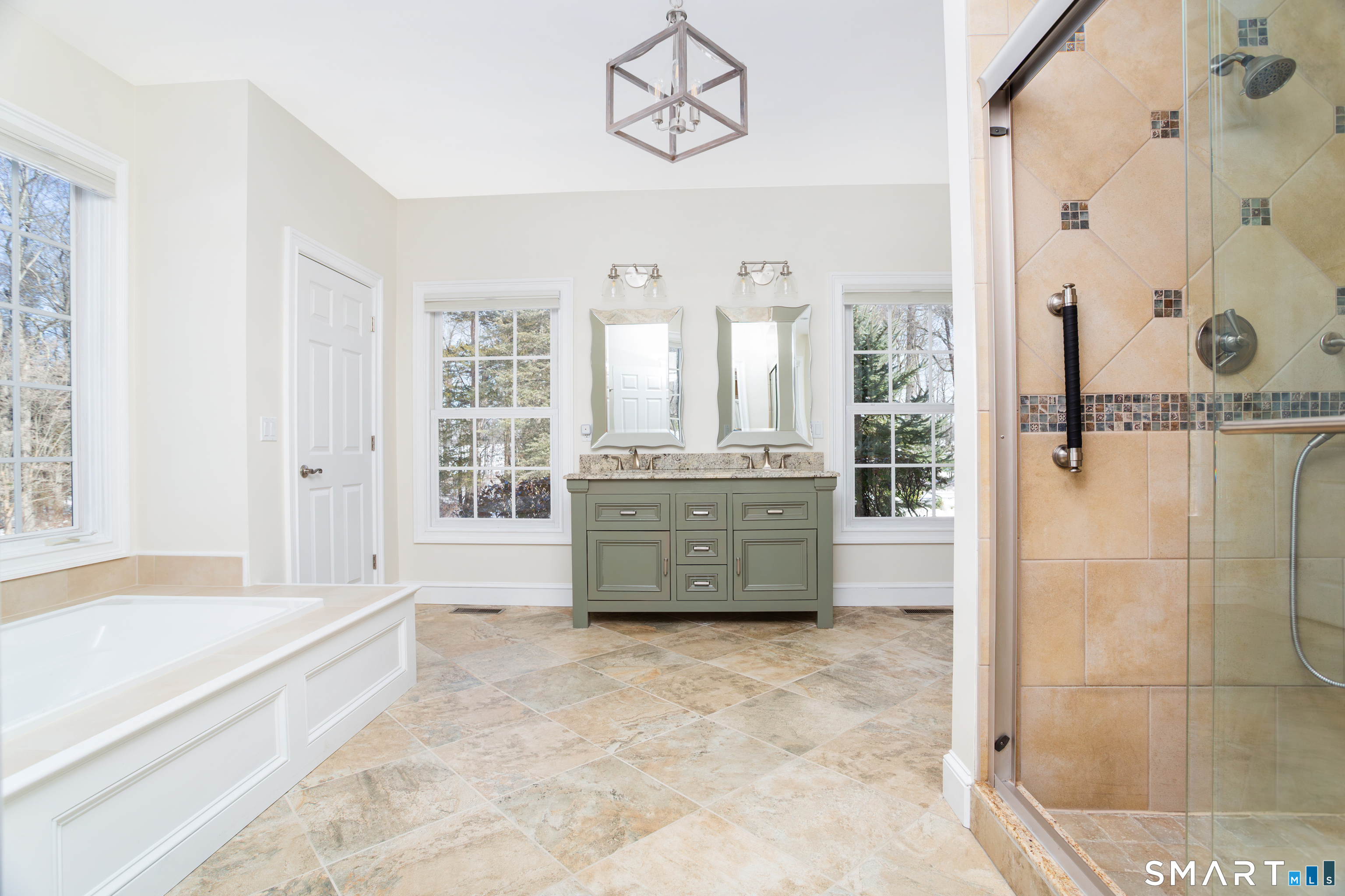51 Wilson Road Easton, CT 06612 - Photo 16 of 41 a bathroom with a tub sink and shower