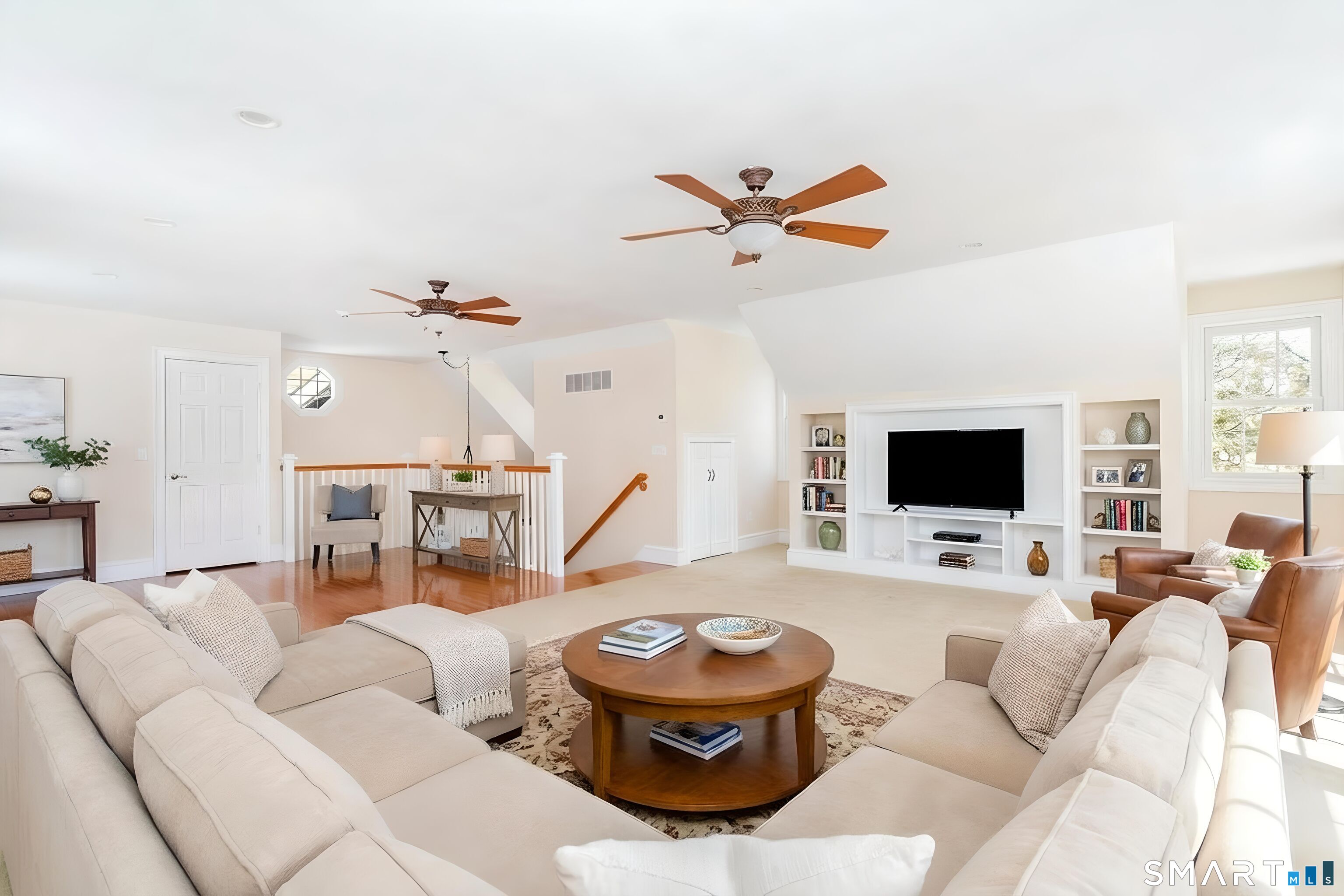 51 Wilson Road Easton, CT 06612 - Photo 17 of 41 a living room with furniture and a flat screen tv