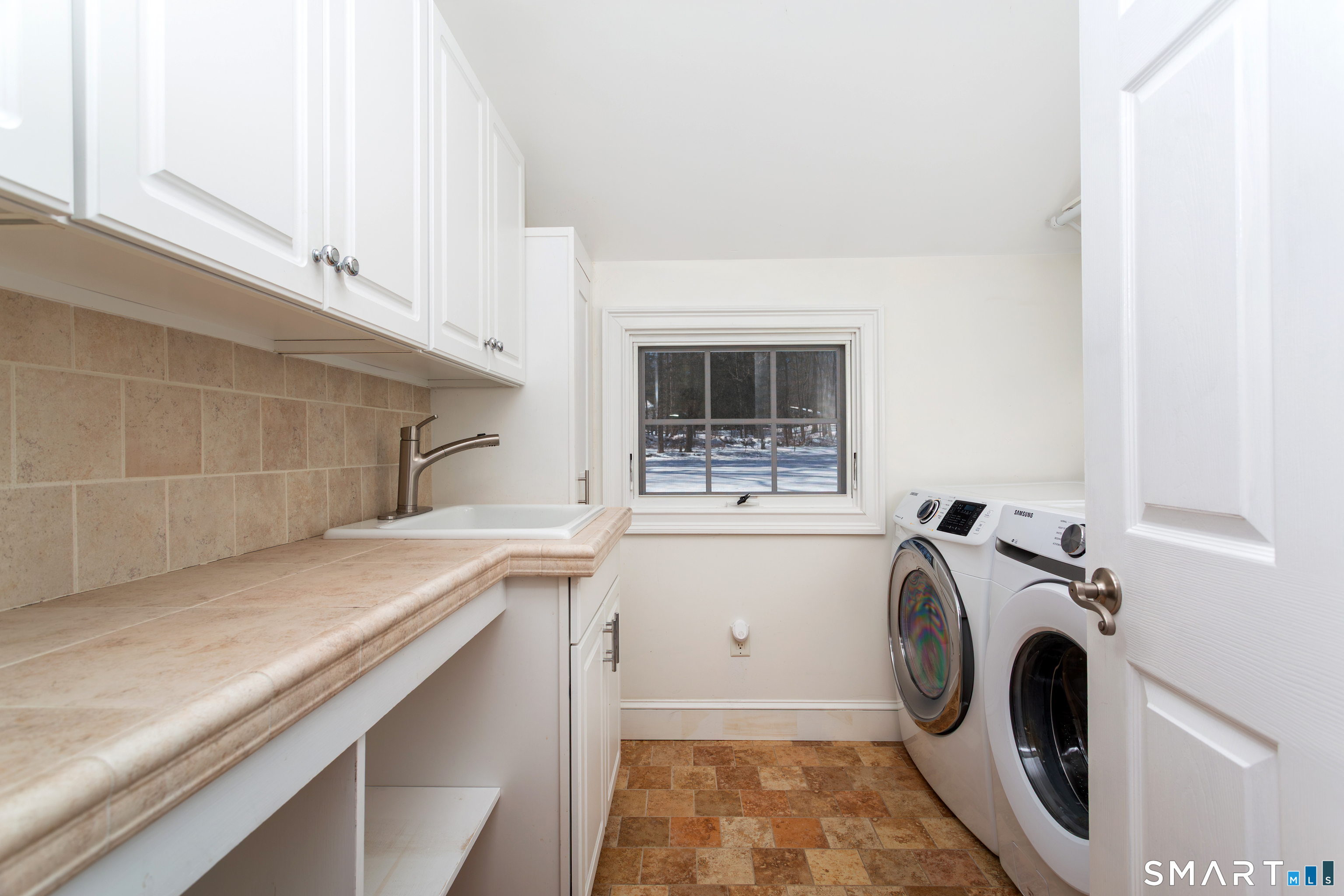 51 Wilson Road Easton, CT 06612 - Photo 24 of 41 a utility room with sink dryer and washer