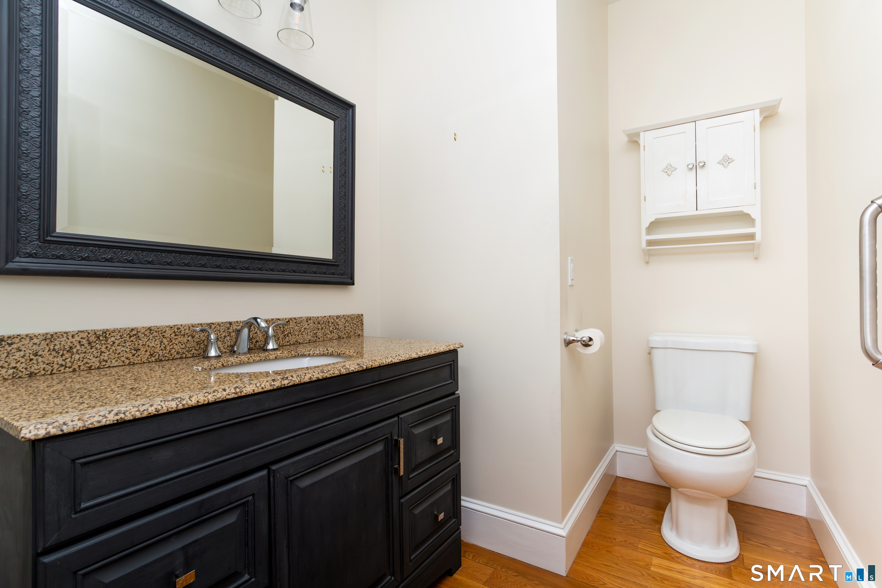 51 Wilson Road Easton, CT 06612 - Photo 25 of 41 a bathroom with a toilet sink and mirror
