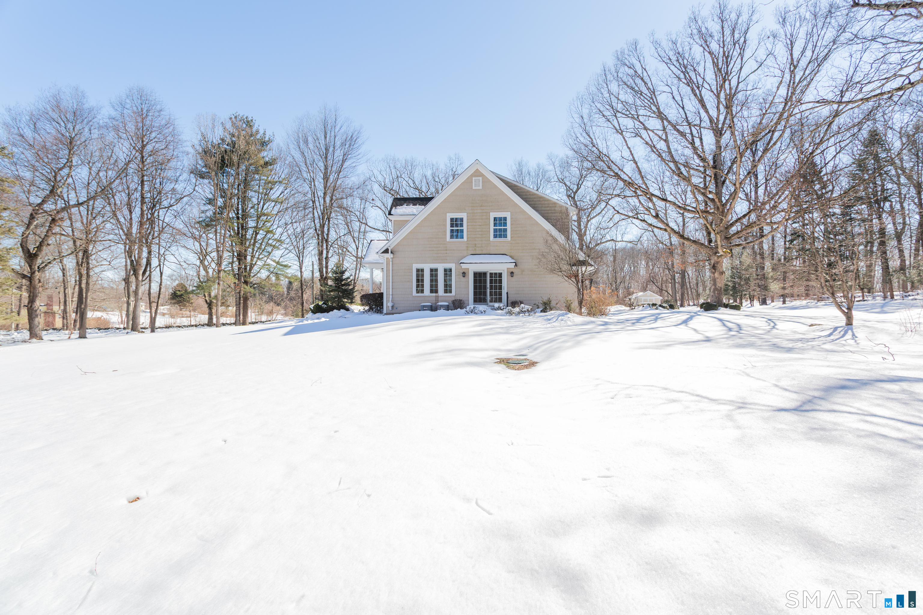 51 Wilson Road Easton, CT 06612 - Photo 34 of 41 a front view of a house with a yard