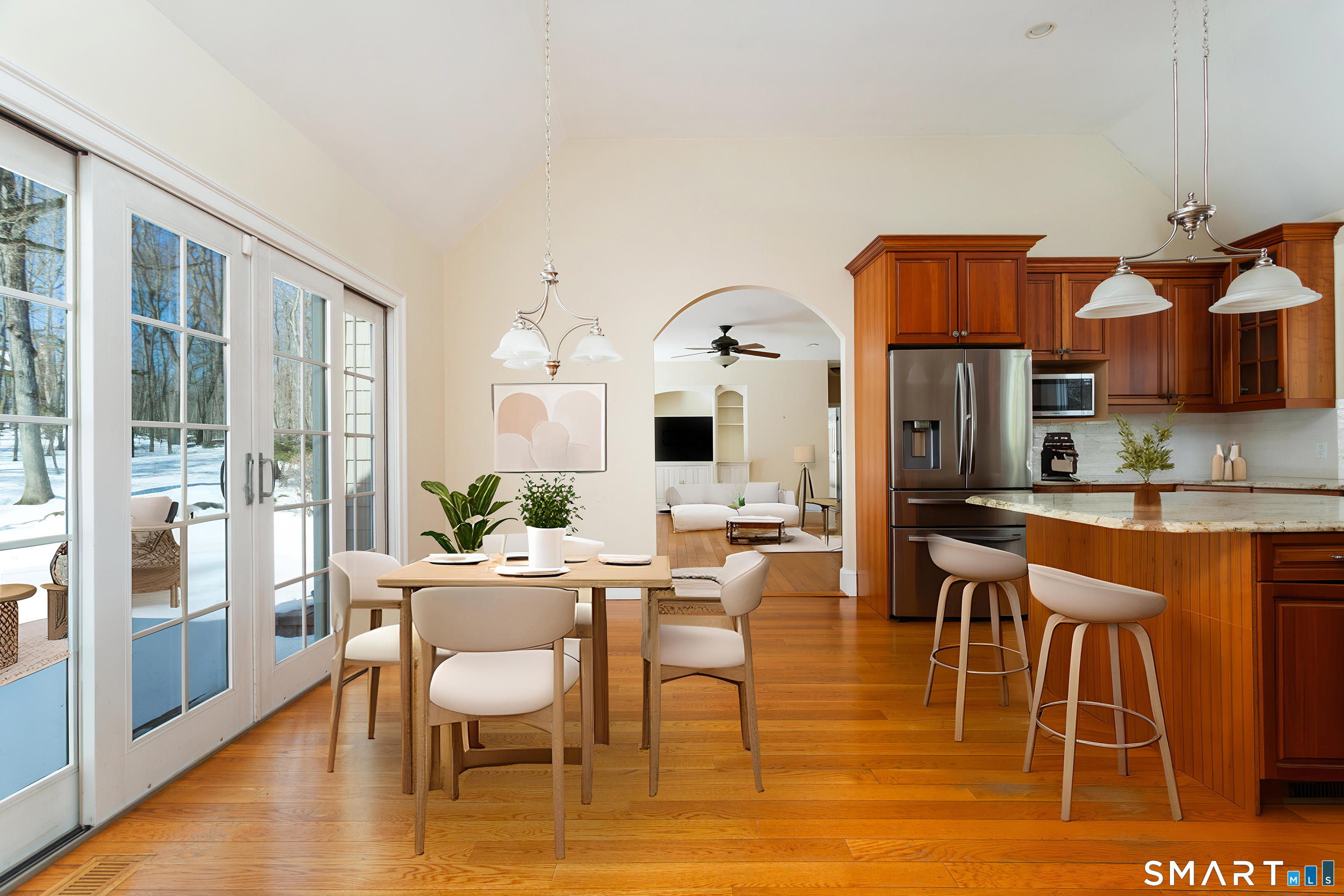 51 Wilson Road Easton, CT 06612 - Photo 36 of 41 a view of a dining room with furniture a rug and wooden floor