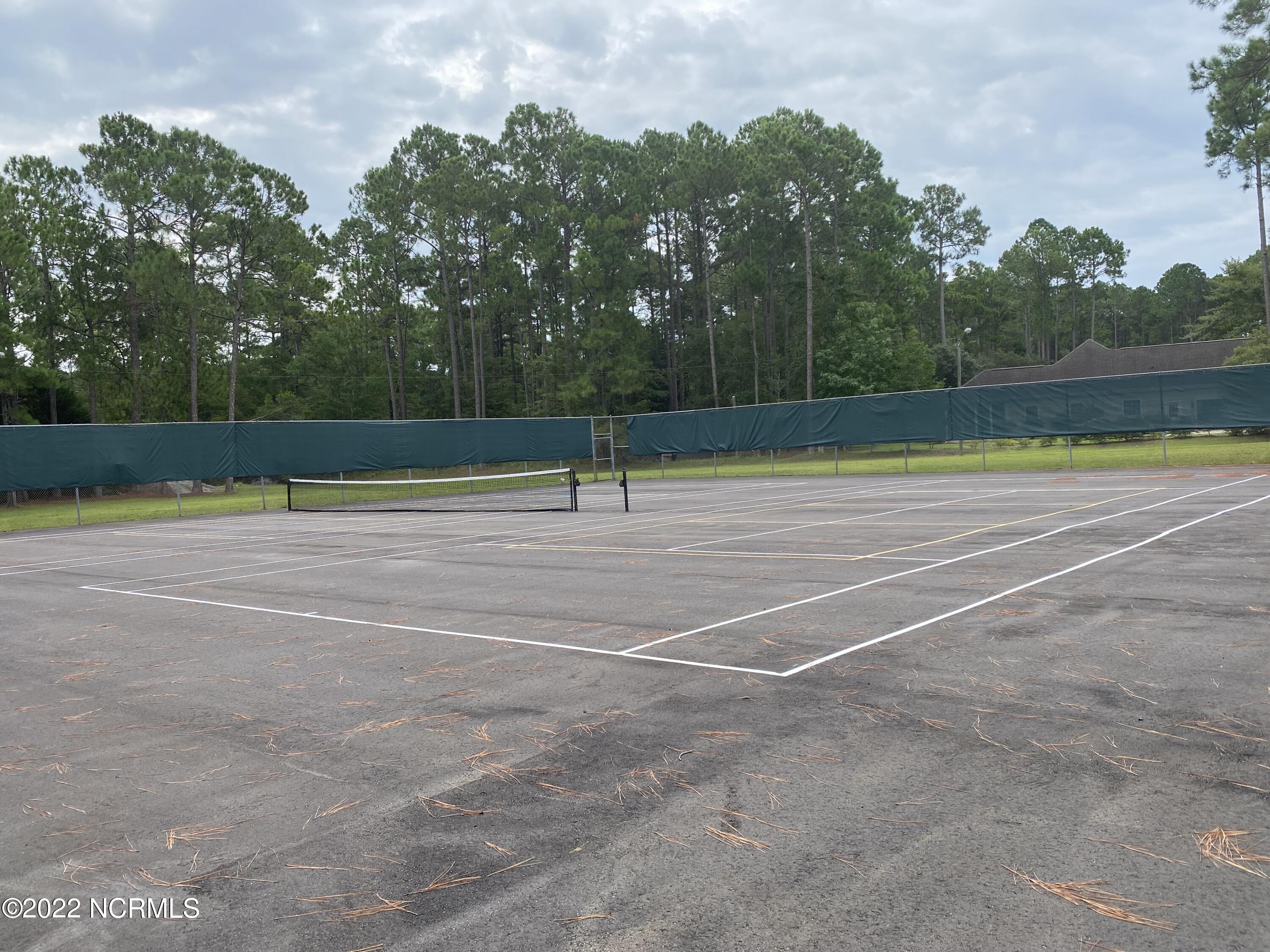 548 Boundary Loop Road Northwest Calabash, NC 28467 - Photo 12 of 13 CSN tennis court close-up