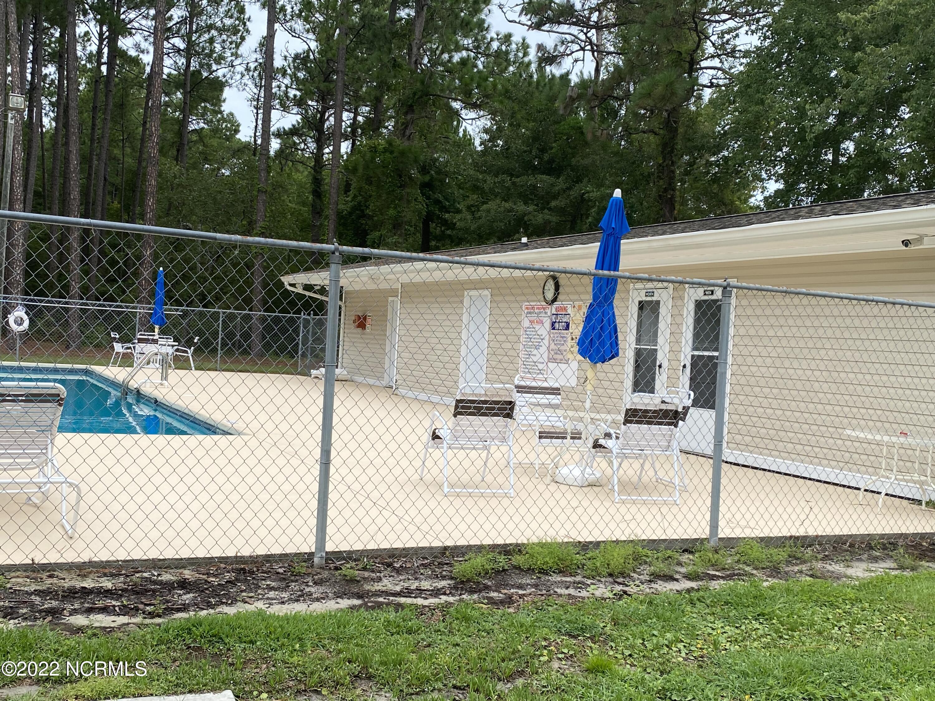 548 Boundary Loop Road Northwest Calabash, NC 28467 - Photo 10 of 13 CSN Pool patio area