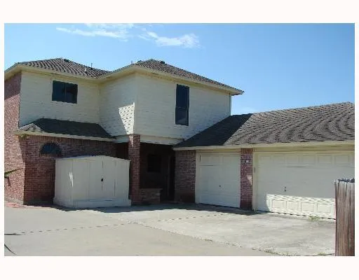 a house view with a outdoor space