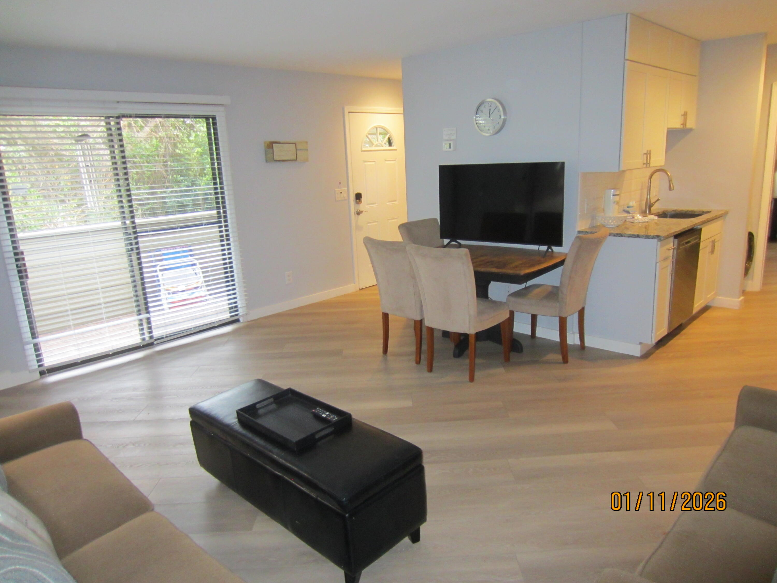 64 Cross Creek Road, Unit 24C Miramar Beach, FL 32550 - Photo 3 of 17 a living room with furniture and a flat screen tv
