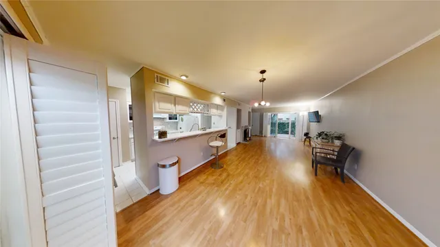 a view of a living room and dining room
