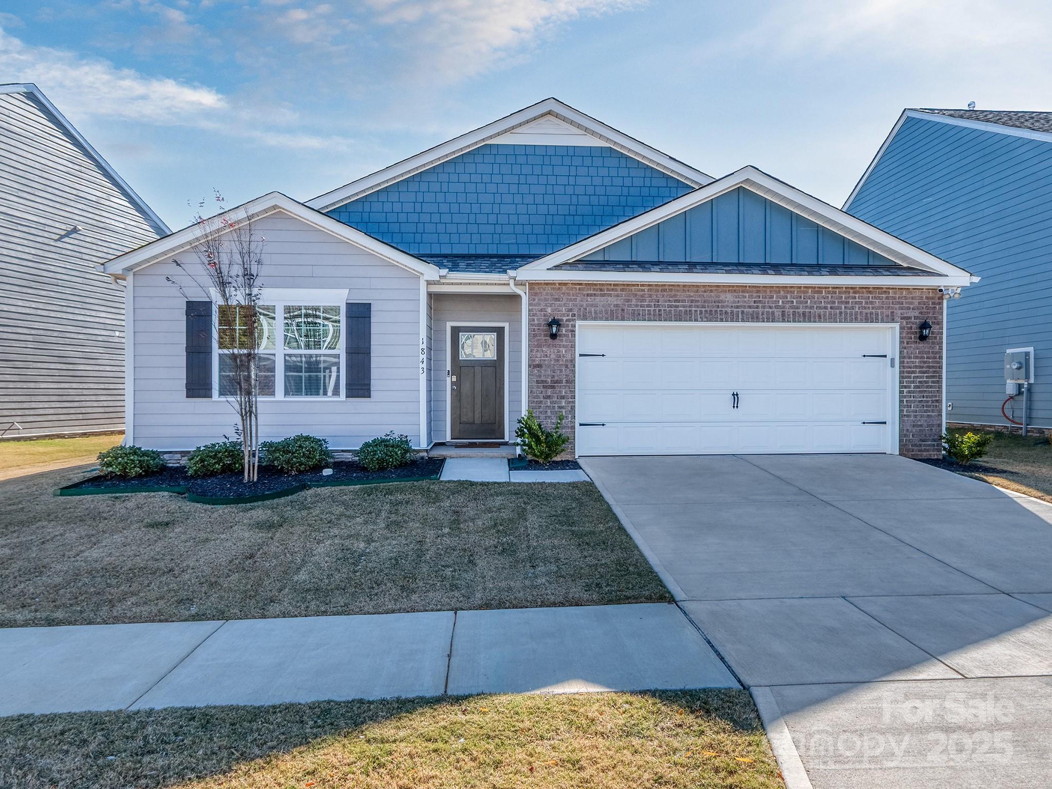1843 Vanderlyn Street Monroe, NC 28112 - Photo 1 of 28 a view of a house with a yard