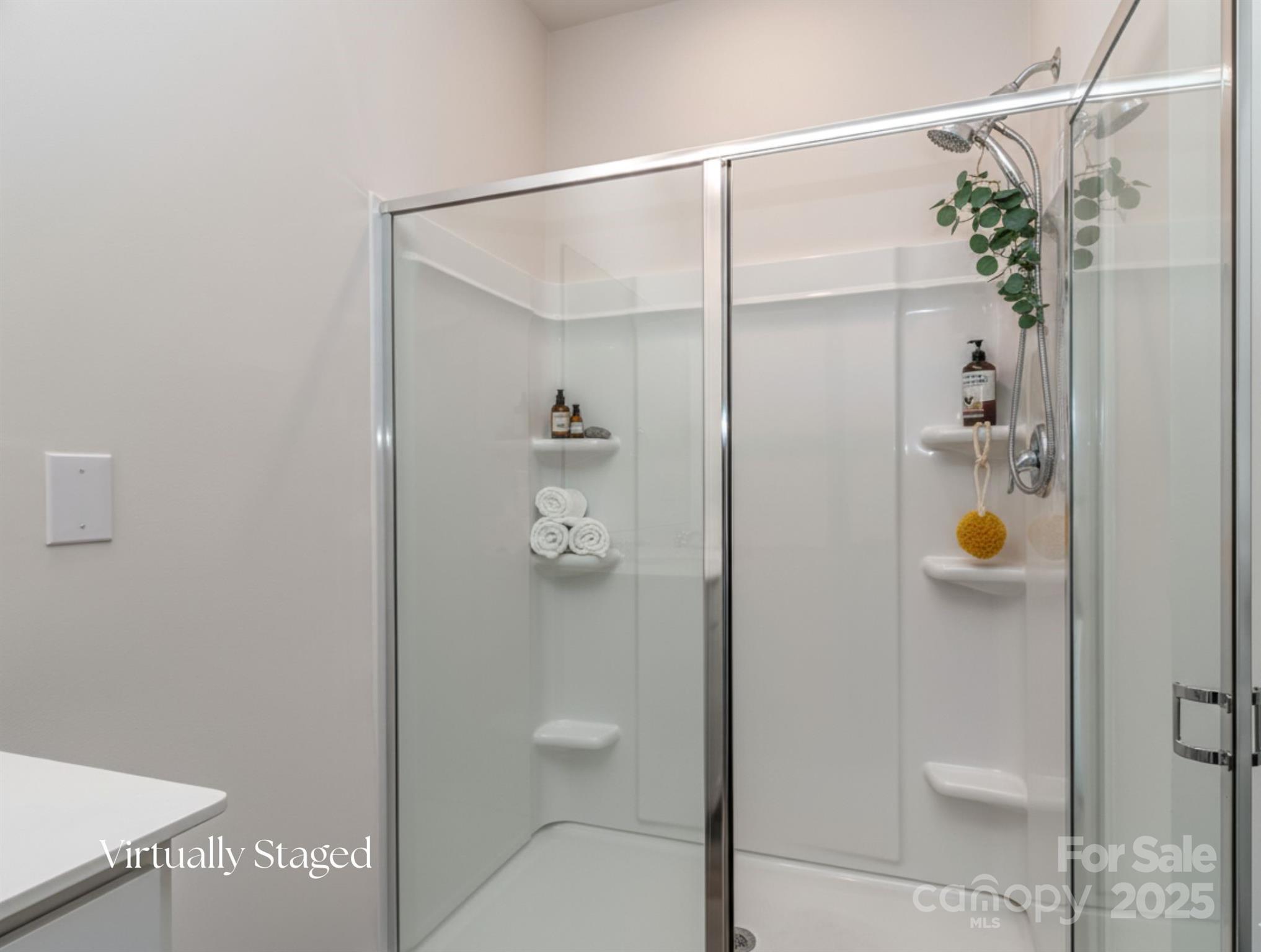 1843 Vanderlyn Street Monroe, NC 28112 - Photo 12 of 28 a bathroom with a shower and toilet