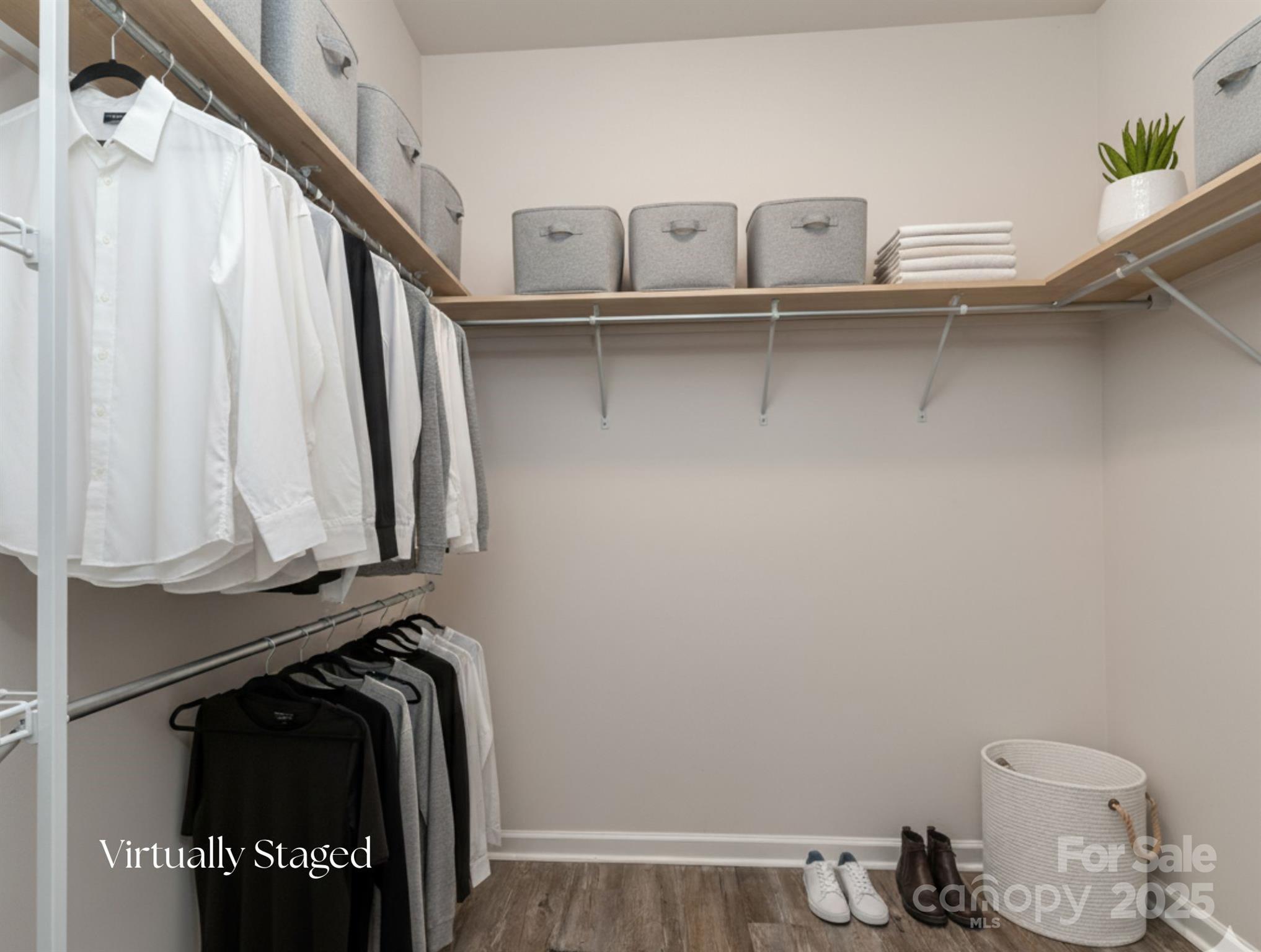 1843 Vanderlyn Street Monroe, NC 28112 - Photo 14 of 28 a view of walk in closet with clothes and shoes