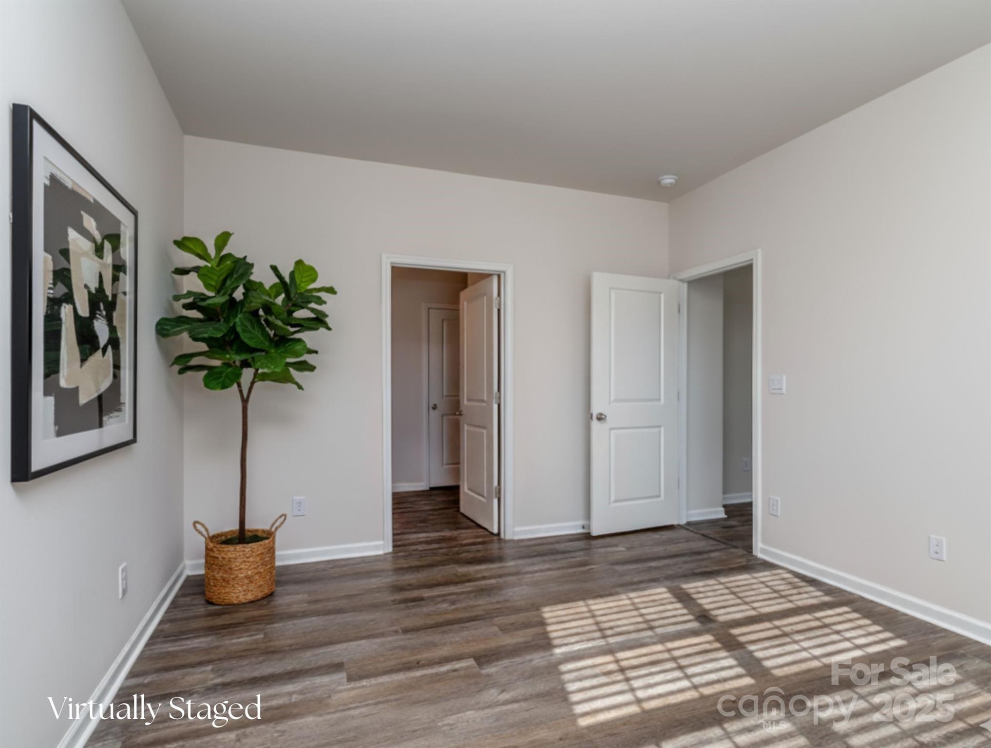 1843 Vanderlyn Street Monroe, NC 28112 - Photo 16 of 28 a room with furniture and potted plant