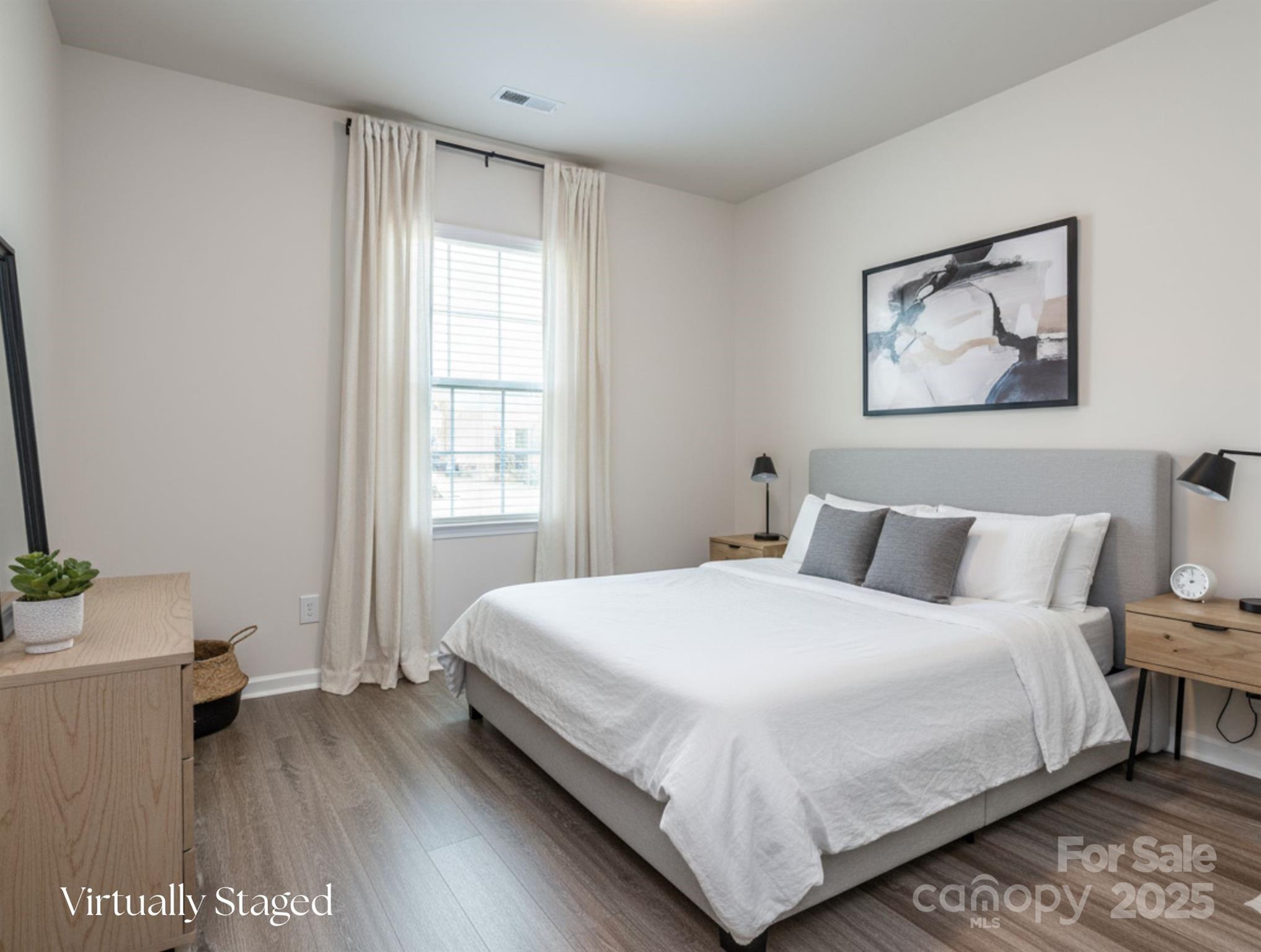 1843 Vanderlyn Street Monroe, NC 28112 - Photo 17 of 28 a bedroom with a bed and a window