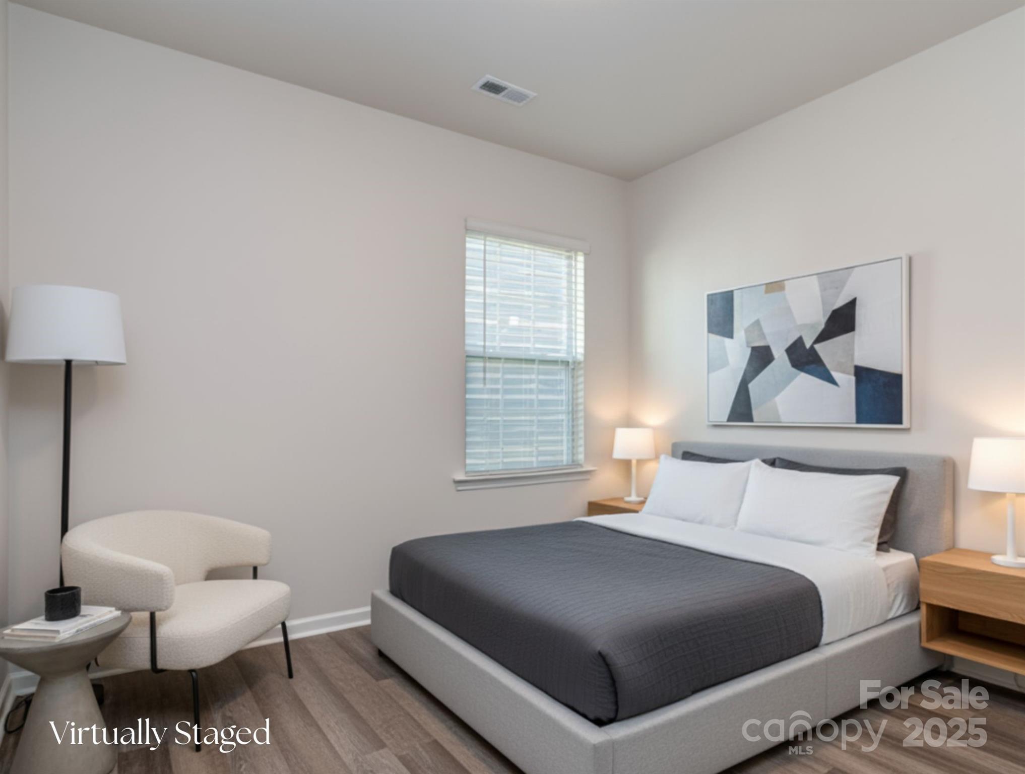 1843 Vanderlyn Street Monroe, NC 28112 - Photo 19 of 28 a bedroom with a bed and a couch