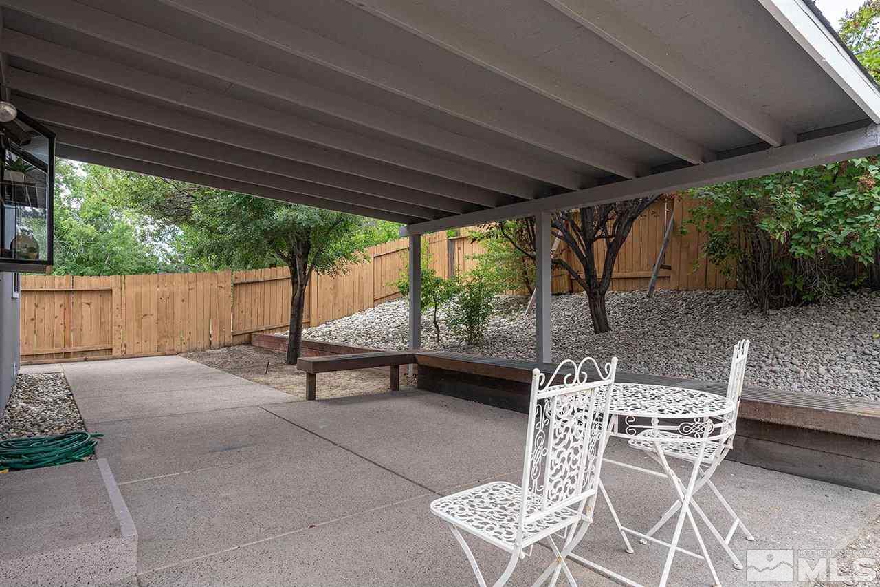 1065 Backer Way Reno, NV 89523 - Photo 17 of 25 a view of an outdoor sitting area with furniture and garden view
