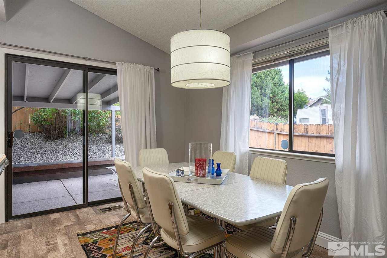 1065 Backer Way Reno, NV 89523 - Photo 9 of 25 a view of a dining room with furniture window and outside view