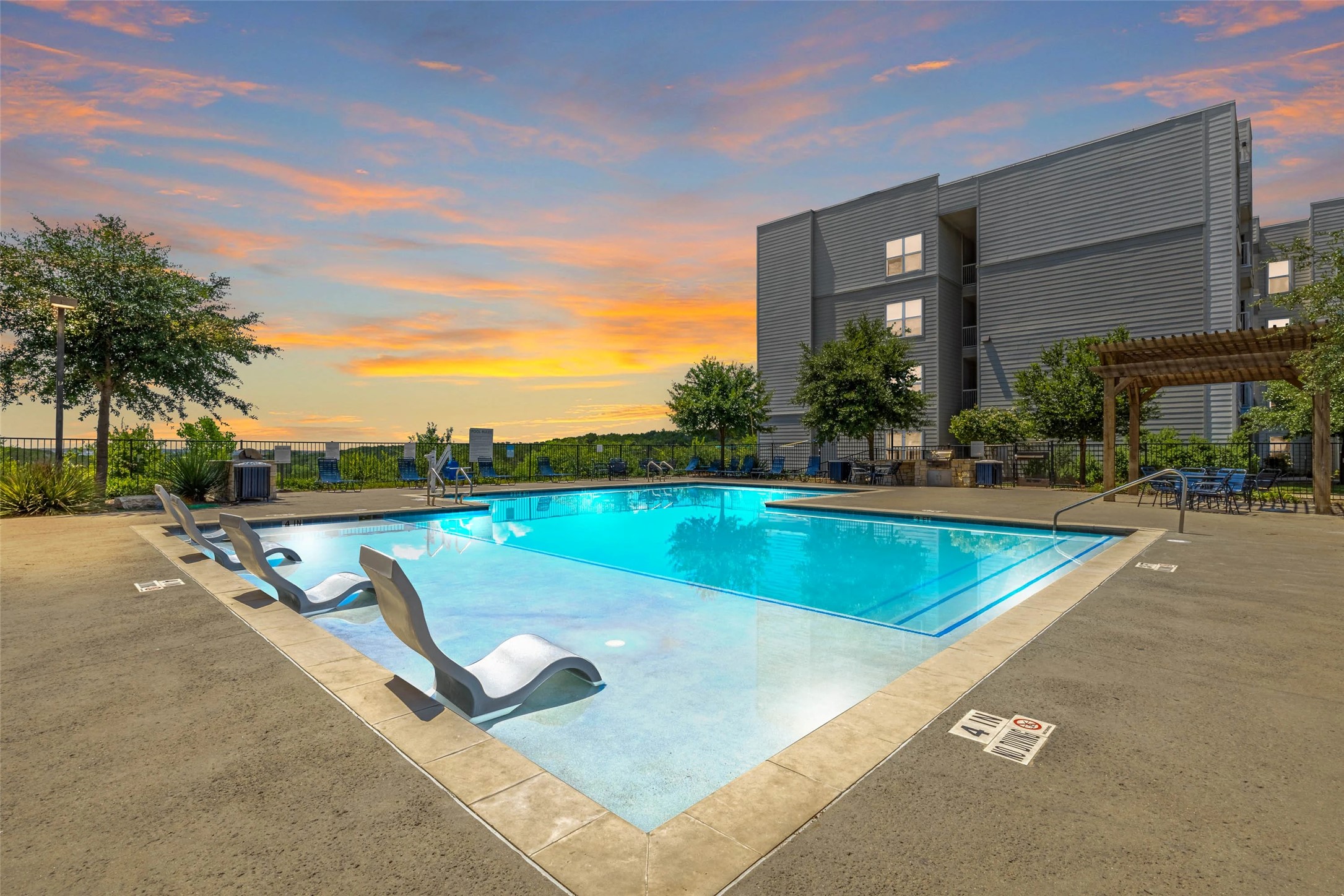5605 Springdale Road, Unit 444424 Austin, TX 78723 - Photo 36 of 36 a view of swimming pool with chairs
